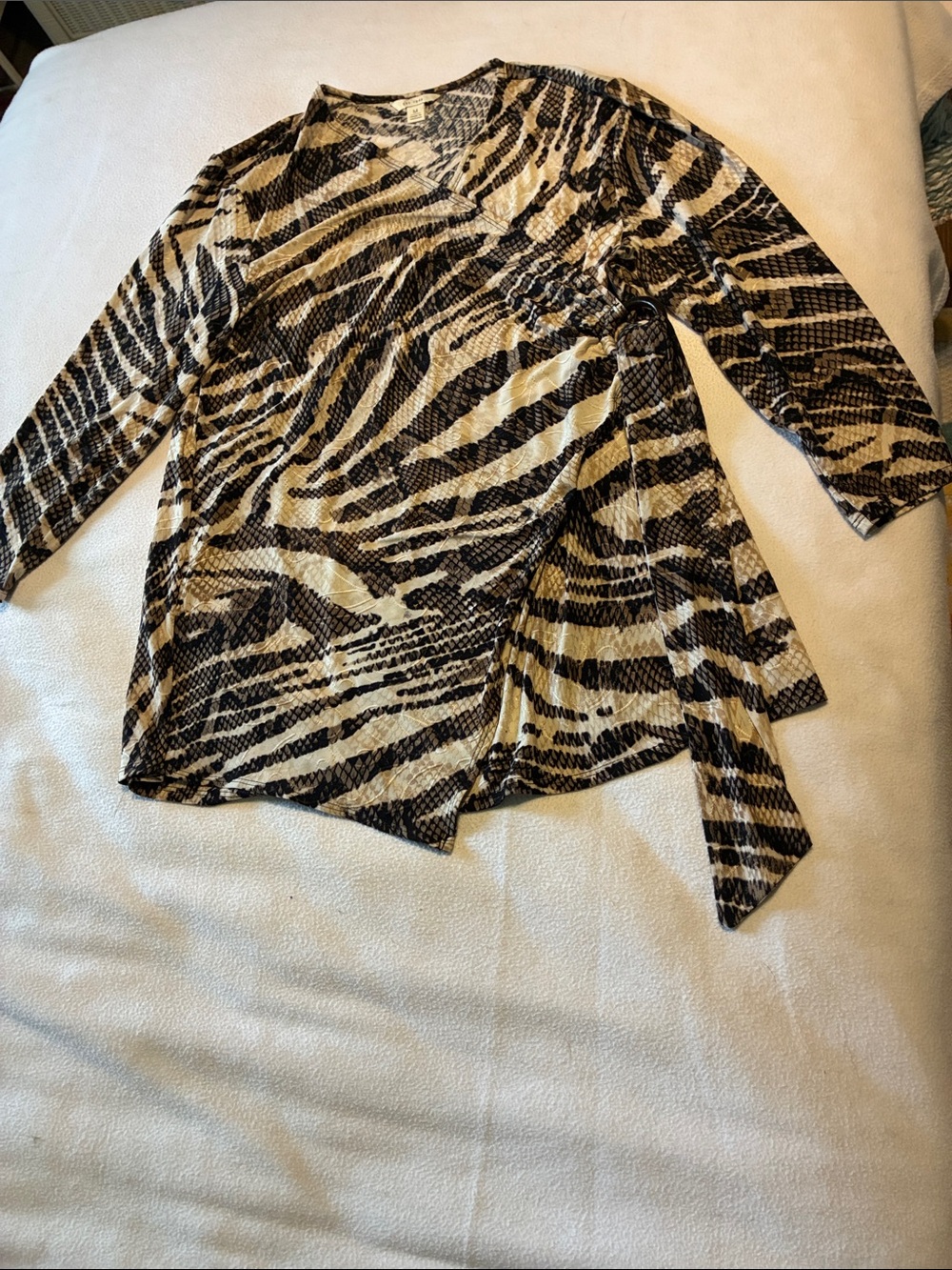 Cato 1946 women’s cream & Brown abstract
Animal print wrap blouse w/ v neckline